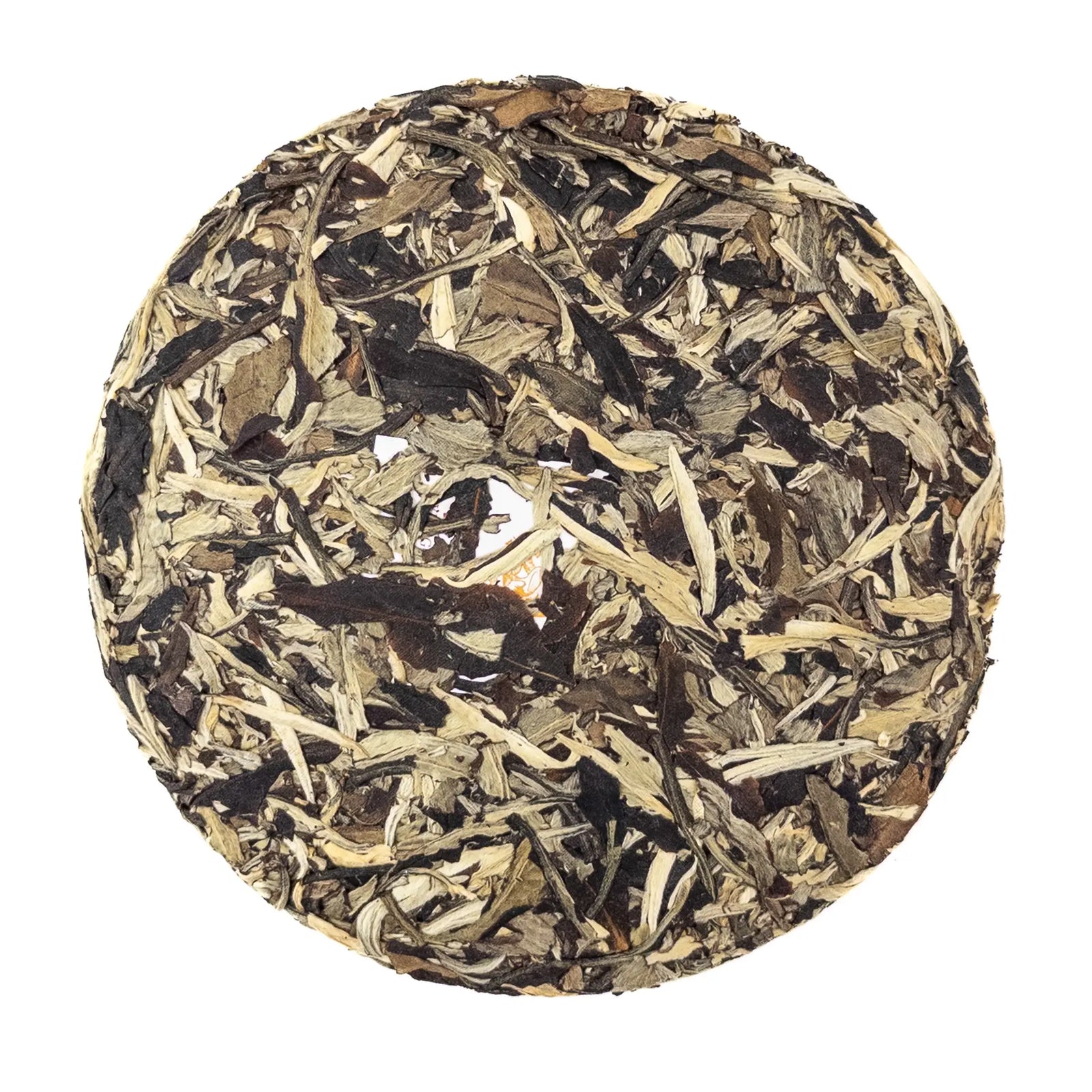 Round tea cake with dried leaves on a white background