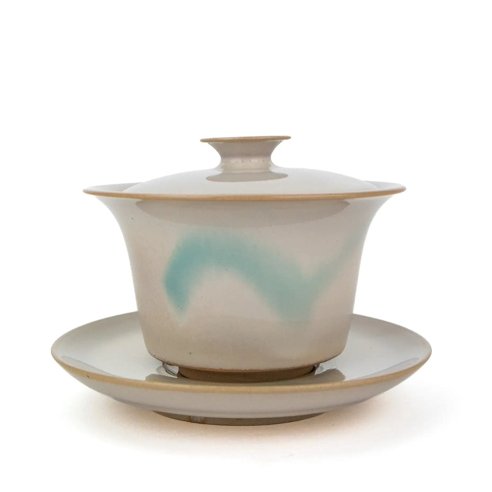 White Huaning Gaiwan with a little bit of blue in the glaze. It comes with a saucer.