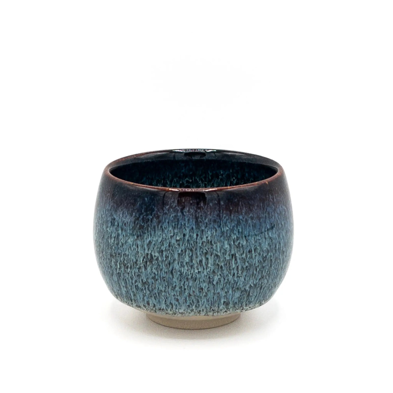 Blue ceramic cup on a white background