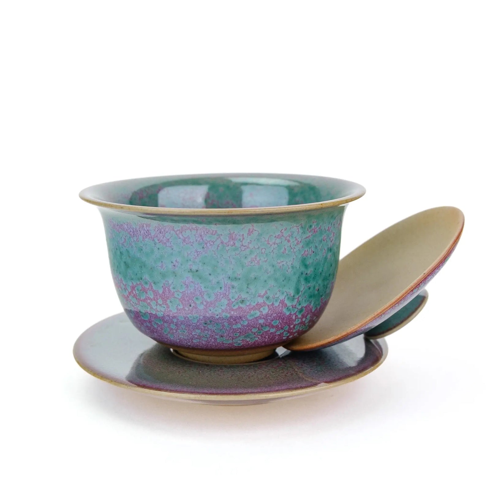 Huaning gaiwan #501 bowl on its saucer with the lid propped against it, showing the unglazed underside of the lid