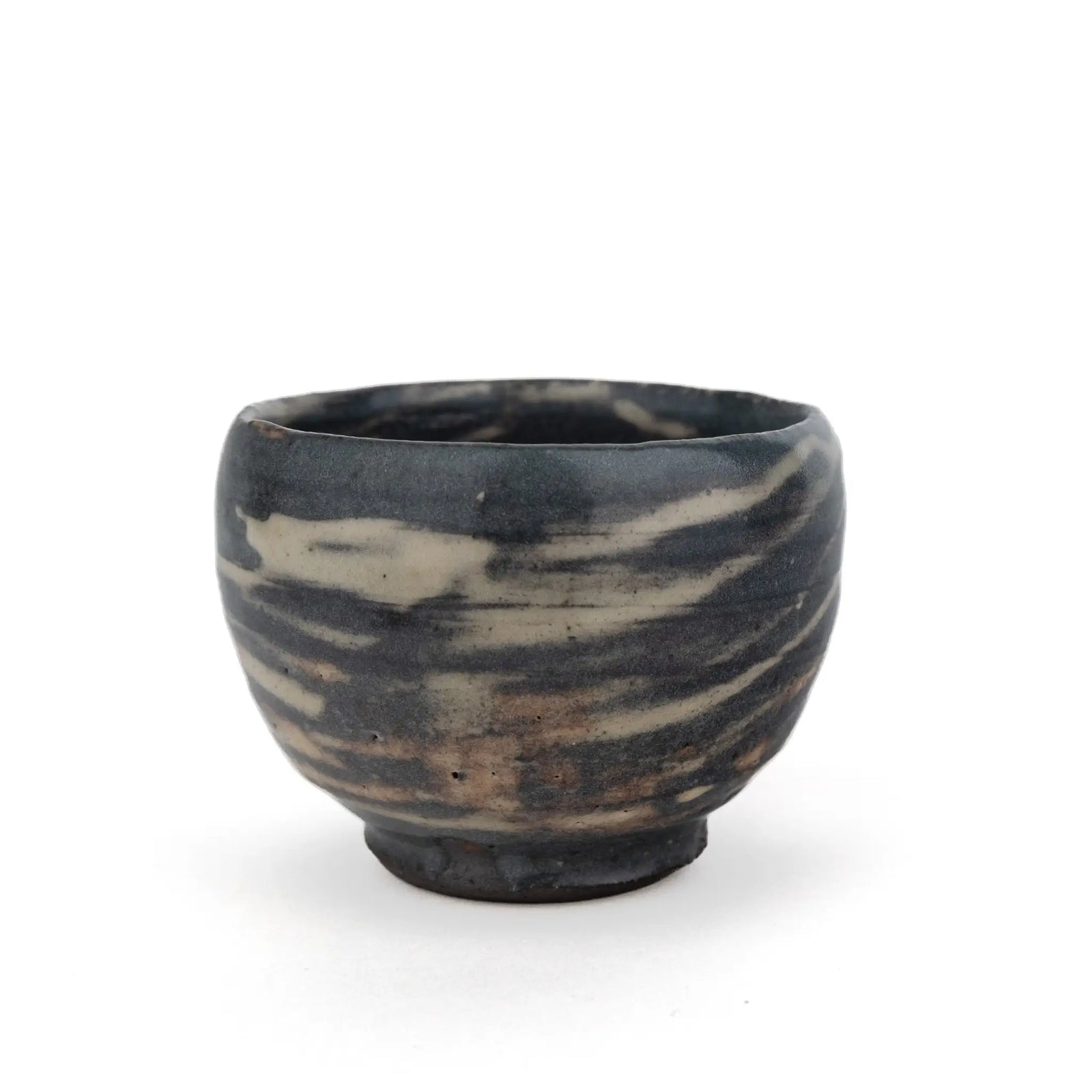 Grey handmade tea cup without a handle and with a white streaky glaze