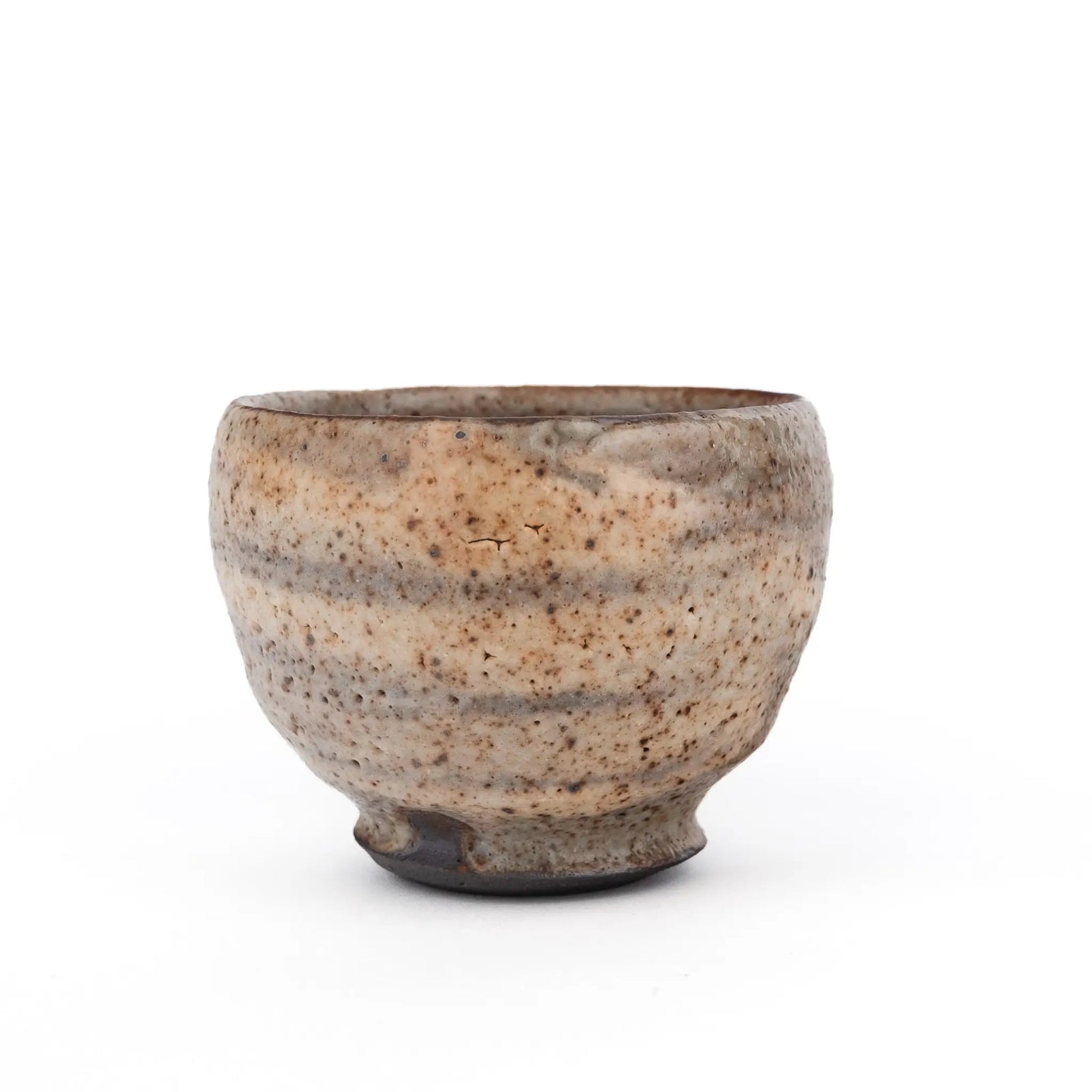 Ceramic tea cup with nice glaze on a white background