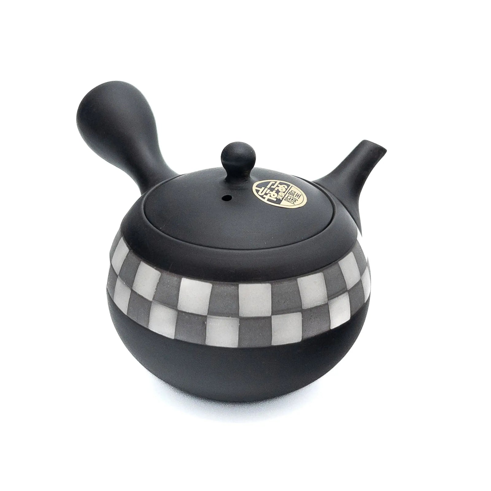 Black teapot with checkered pattern on a white background