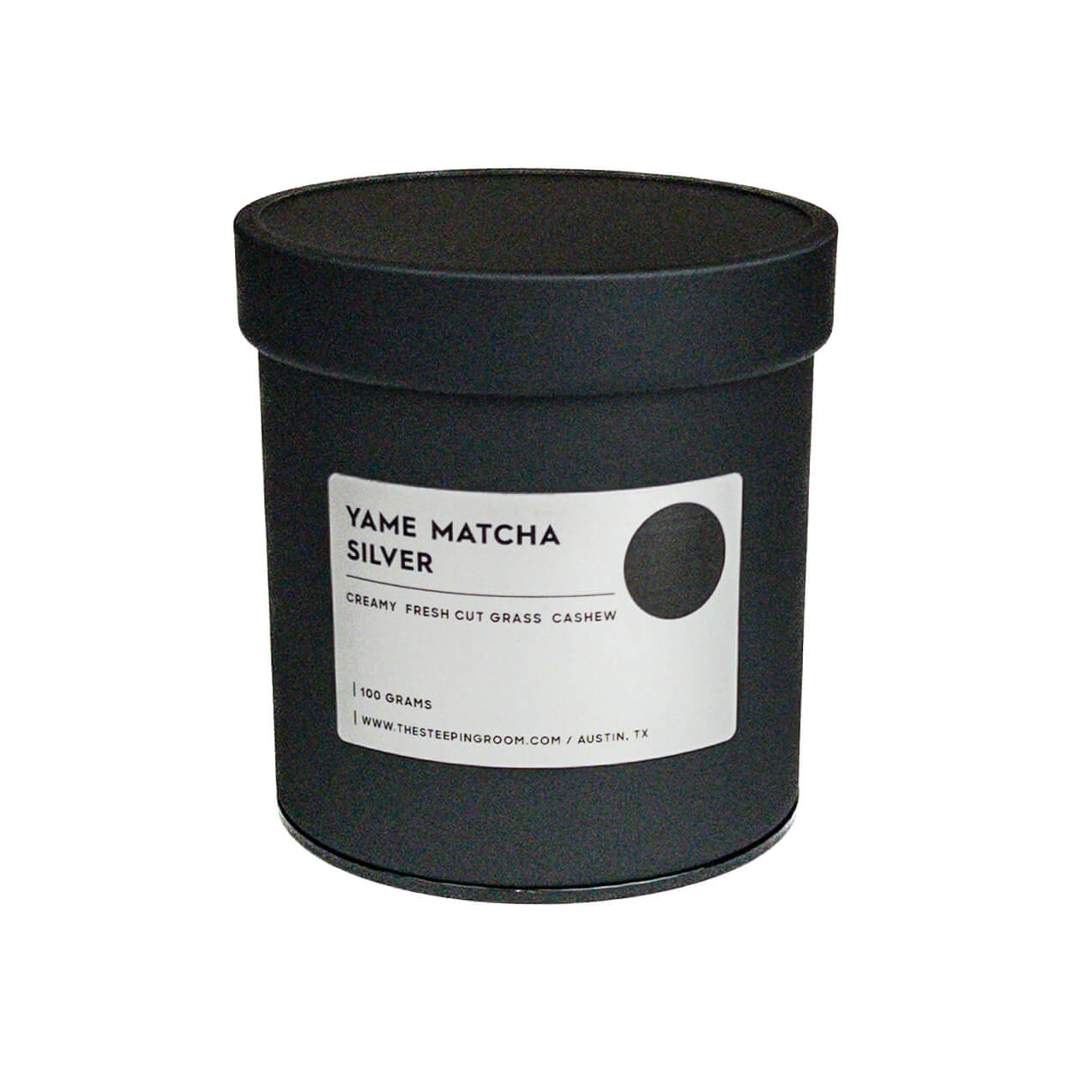 Black matcha container with a white label on a white background