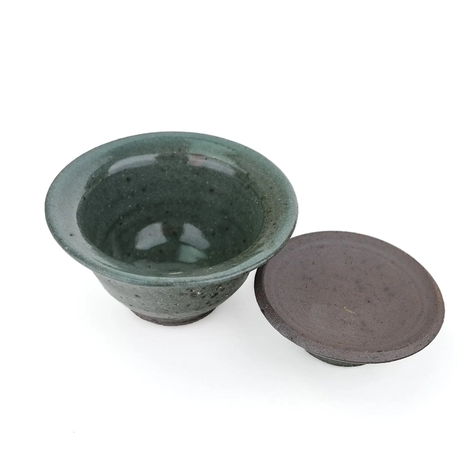 Mark Mohler handmade gaiwan #11 with the lid off and turned over beside the bowl, showing the glossy green glaze inside the bowl and the unglazed underside of the lid