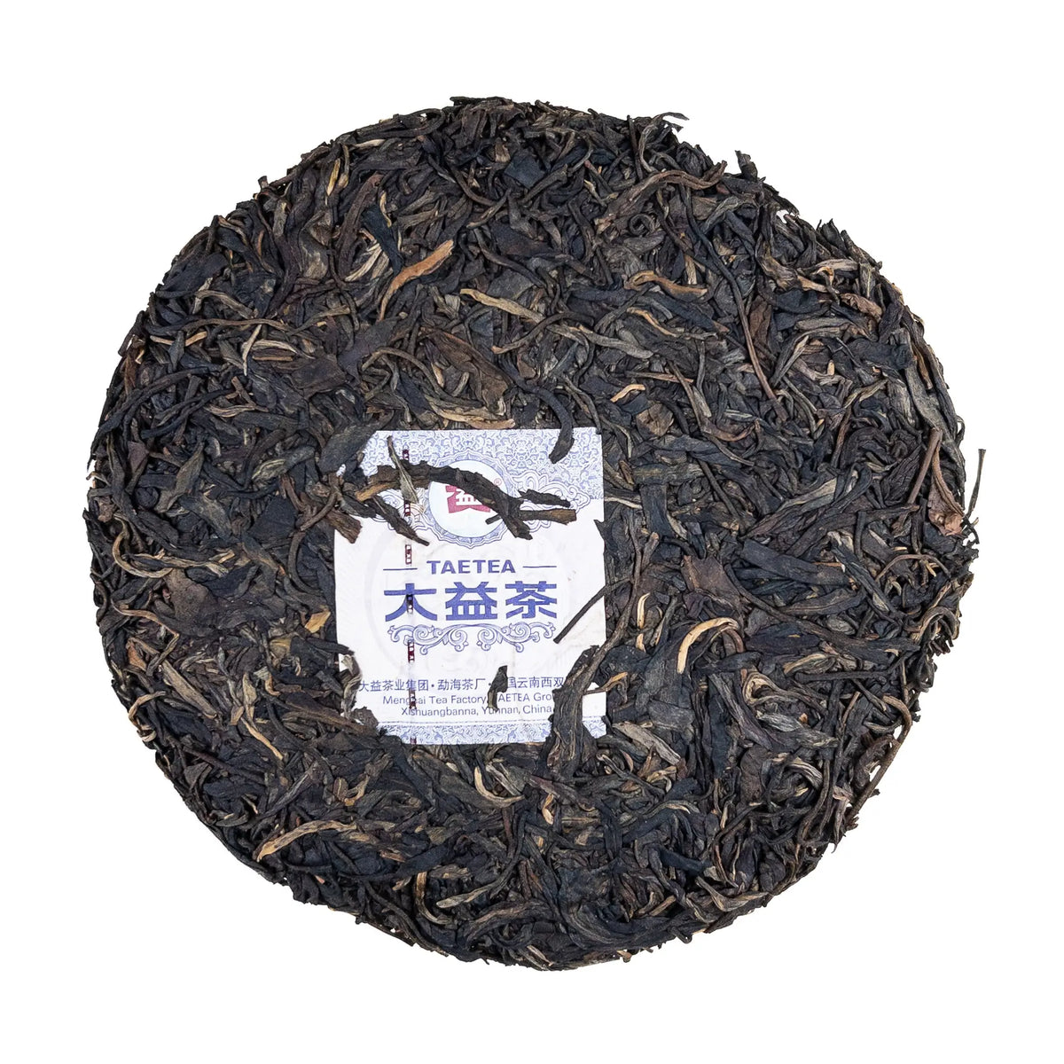 Round cake of puerh tea with a Dayi neifei on a white background