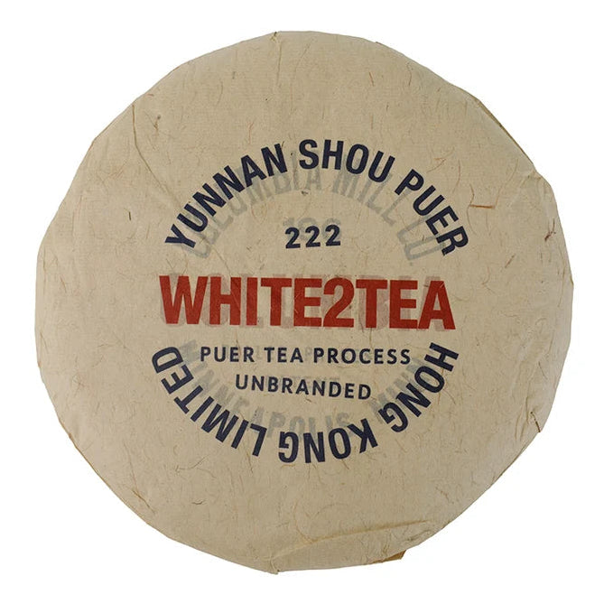 2026 White2Tea Unbranded ripe puerh cake in its paper wrapper, printed Yunnan Shou Puer, White2Tea, Unbranded