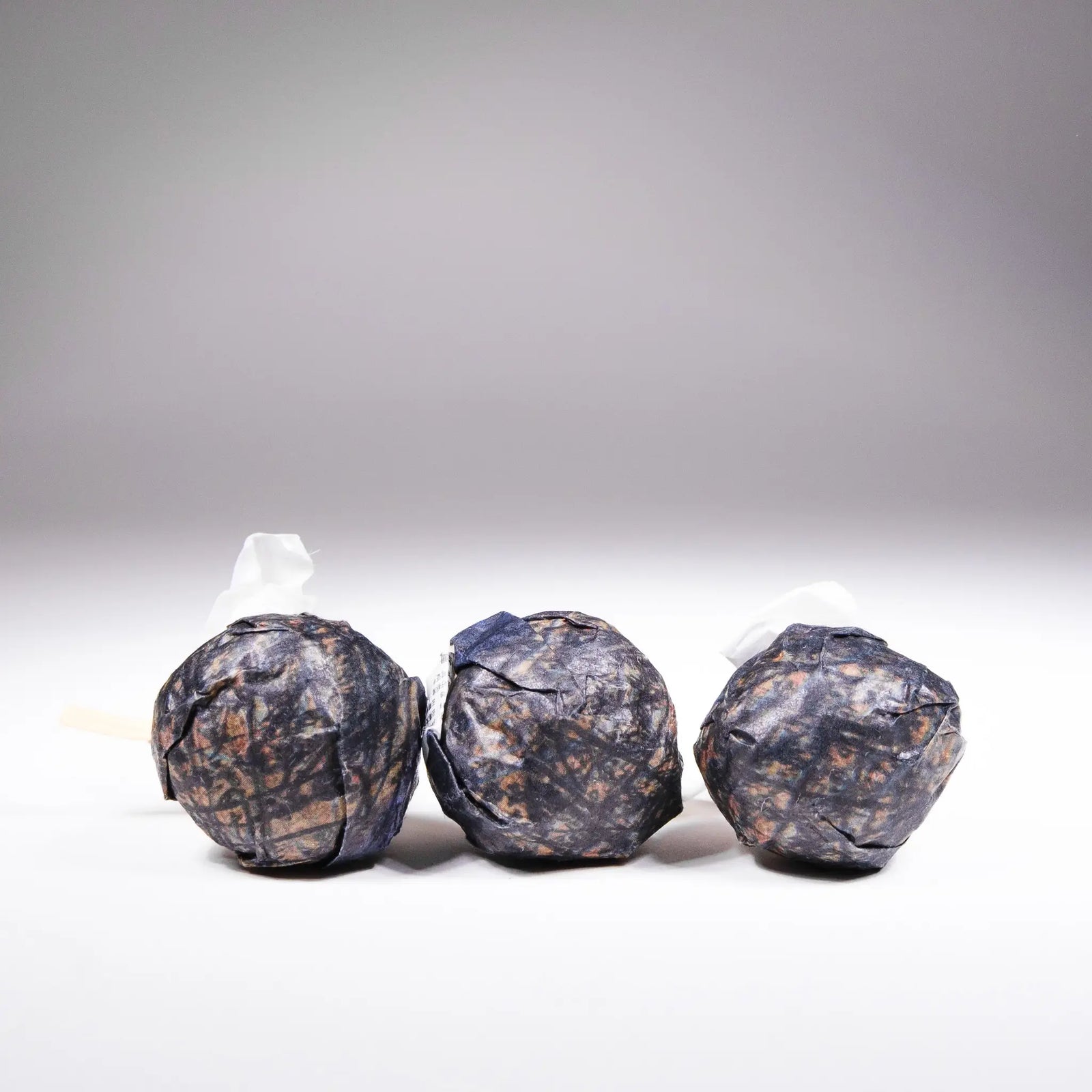 3 individual 2026 White2Tea Swerve Charcoal Roasted Black Tea Minis on a grey background