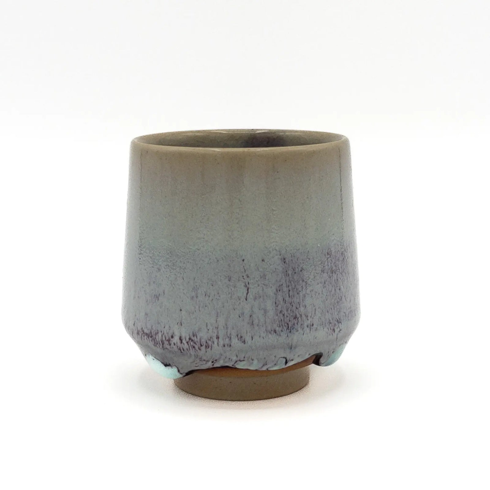 Ceramic cup with a gradient finish on a white background