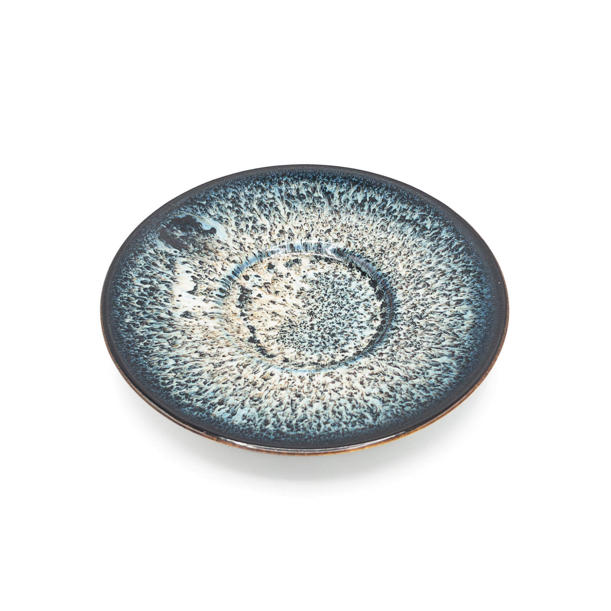 Galaxy Huaning Gaiwan saucer showing crystalline blue and purple glaze pattern