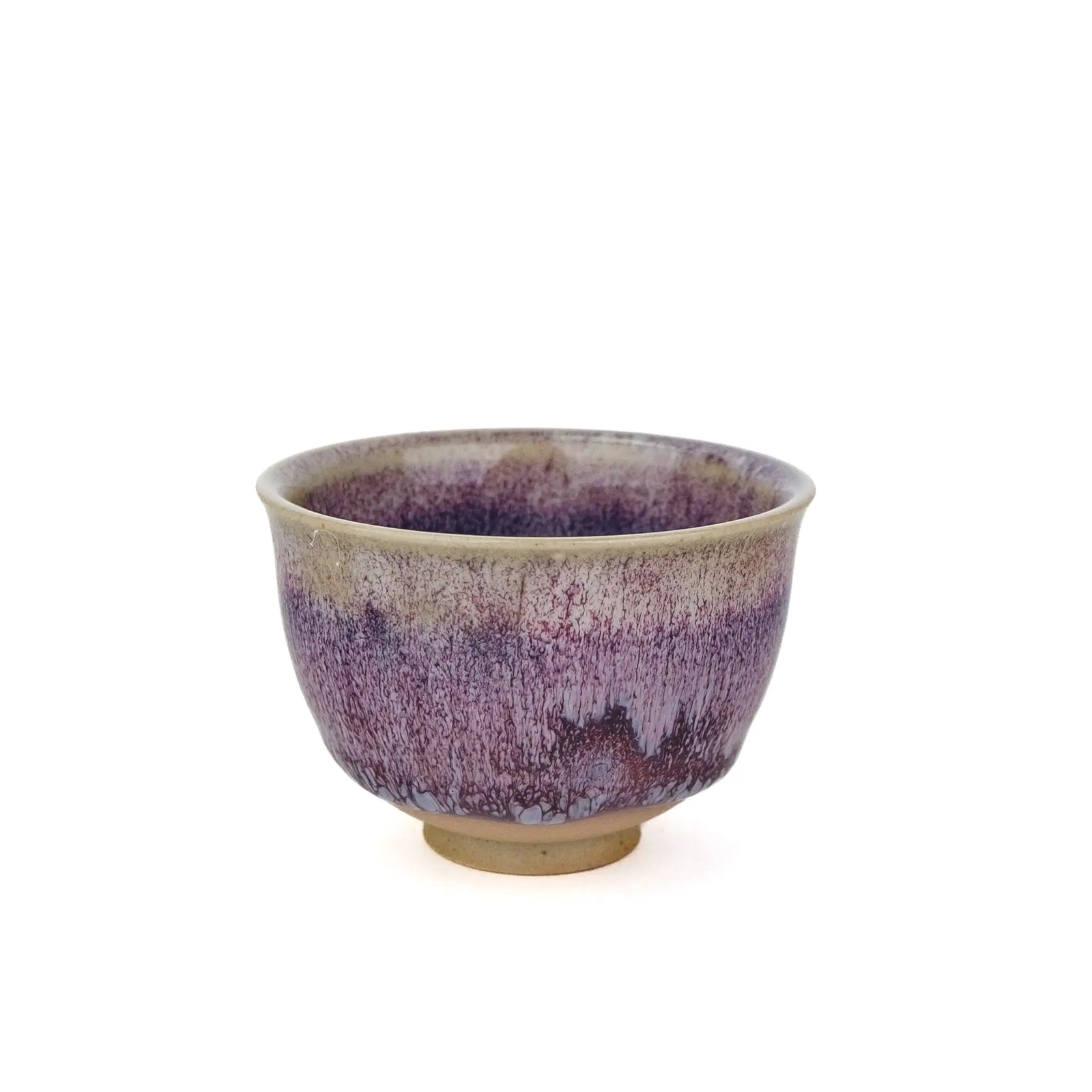 Handmade Huaning Pottery Tea Cup for Gong Fu Tea - Variable Purple Glaze with an unglazed cup foot on a white background