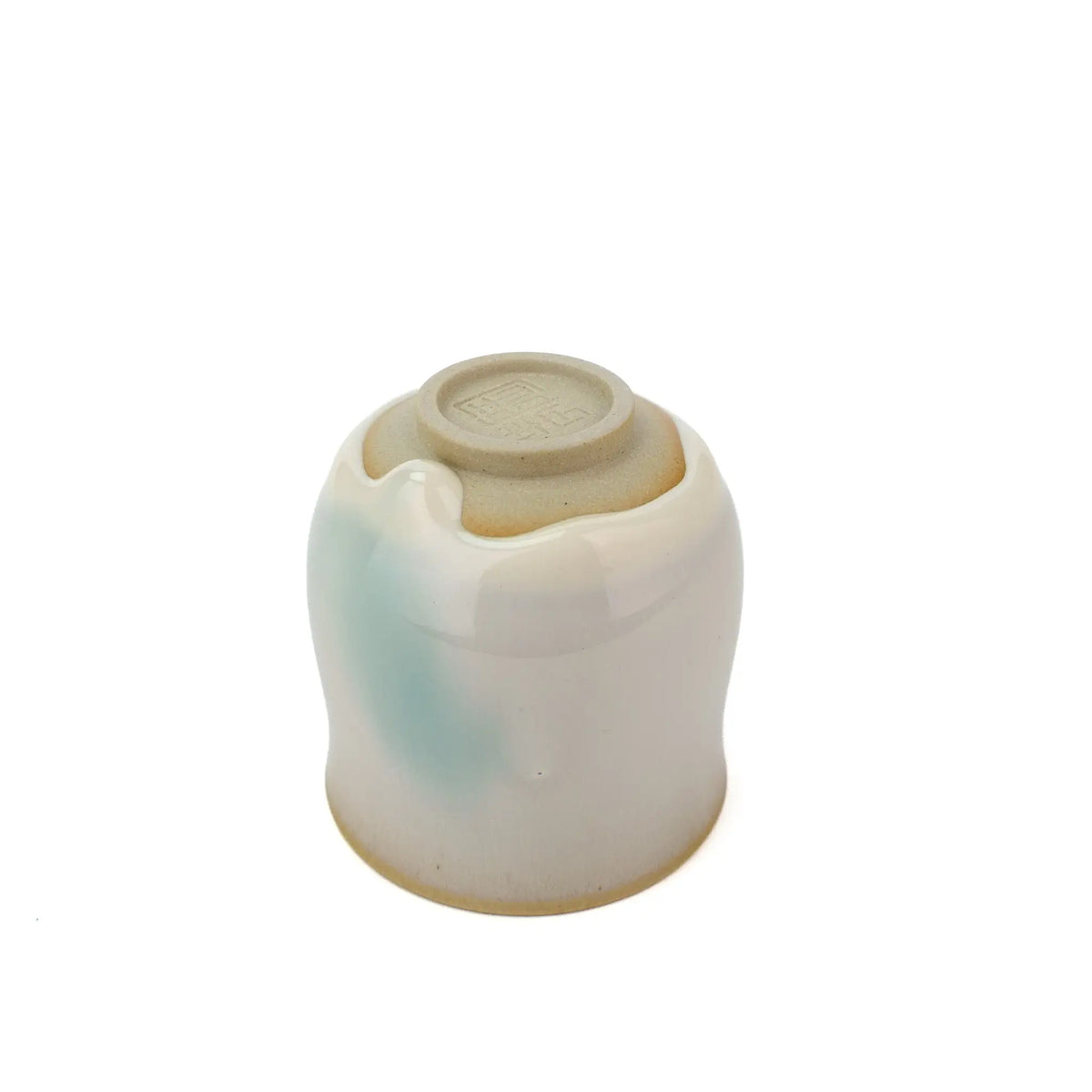 Huaning Pottery Handmade Gong Fu Tea Cup - White Cup with a bit of Blue in the glaze - underside view