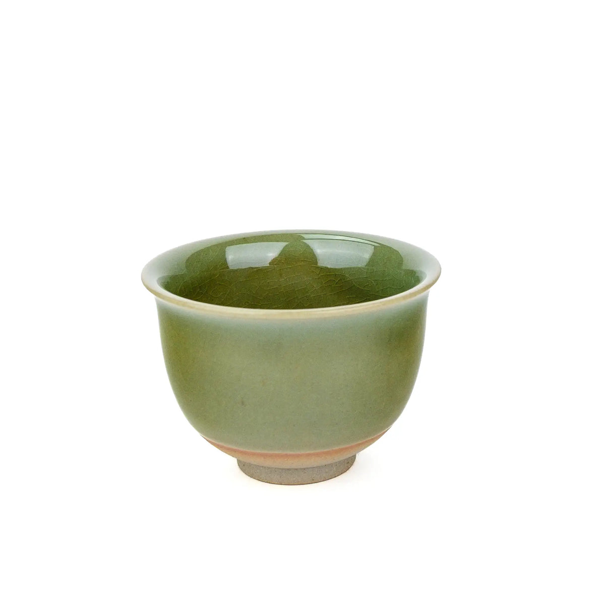 Huaning handmade cup #333 from slightly above, showing the glossy green interior with fine crackle