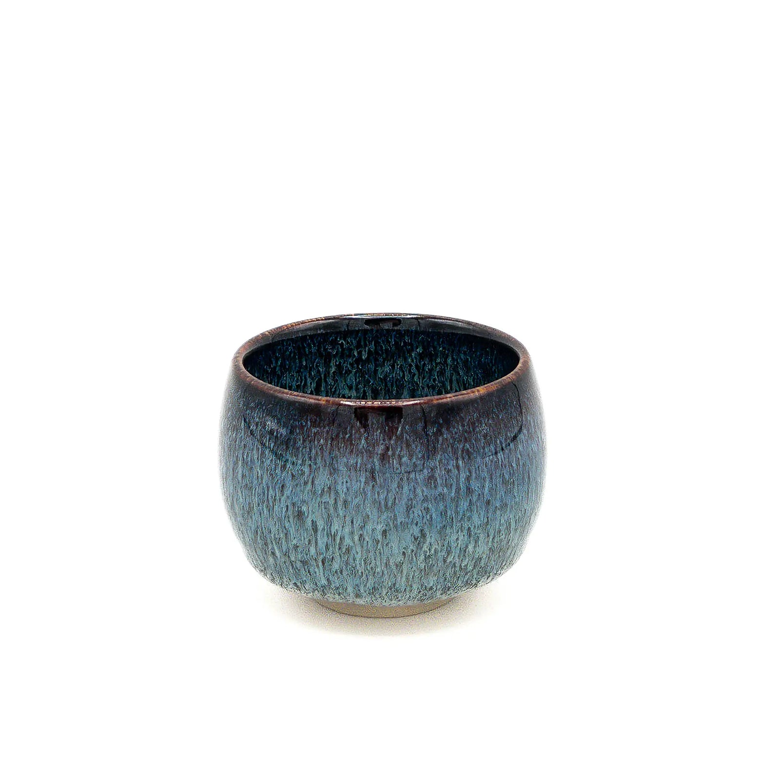 Blue ceramic cup on a white background