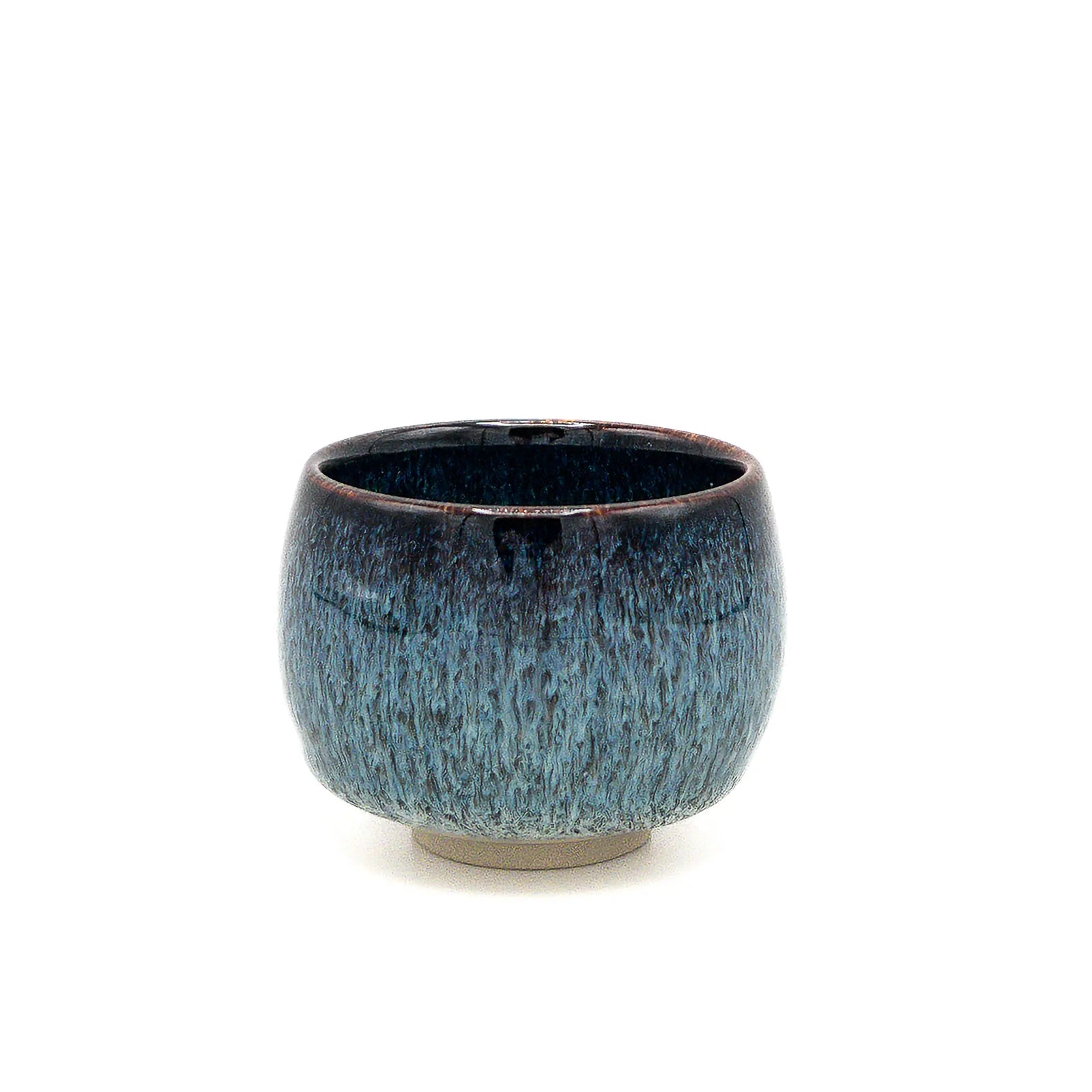 Blue ceramic cup on a white background