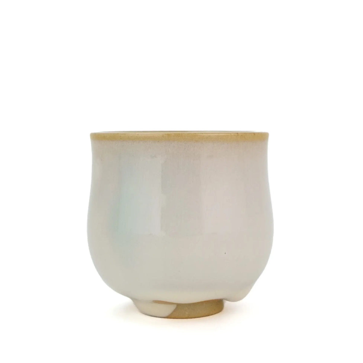 Huaning handmade cup #350, a tall rounded cup in white glaze with a faint blue-green streak and a tan rim