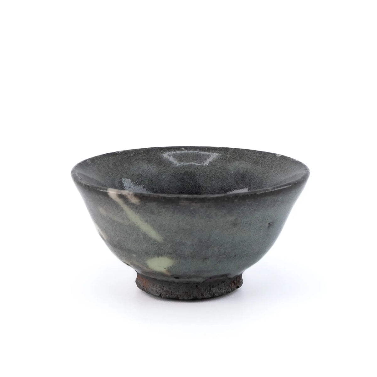 Ceramic cup with a speckled glaze on a white background