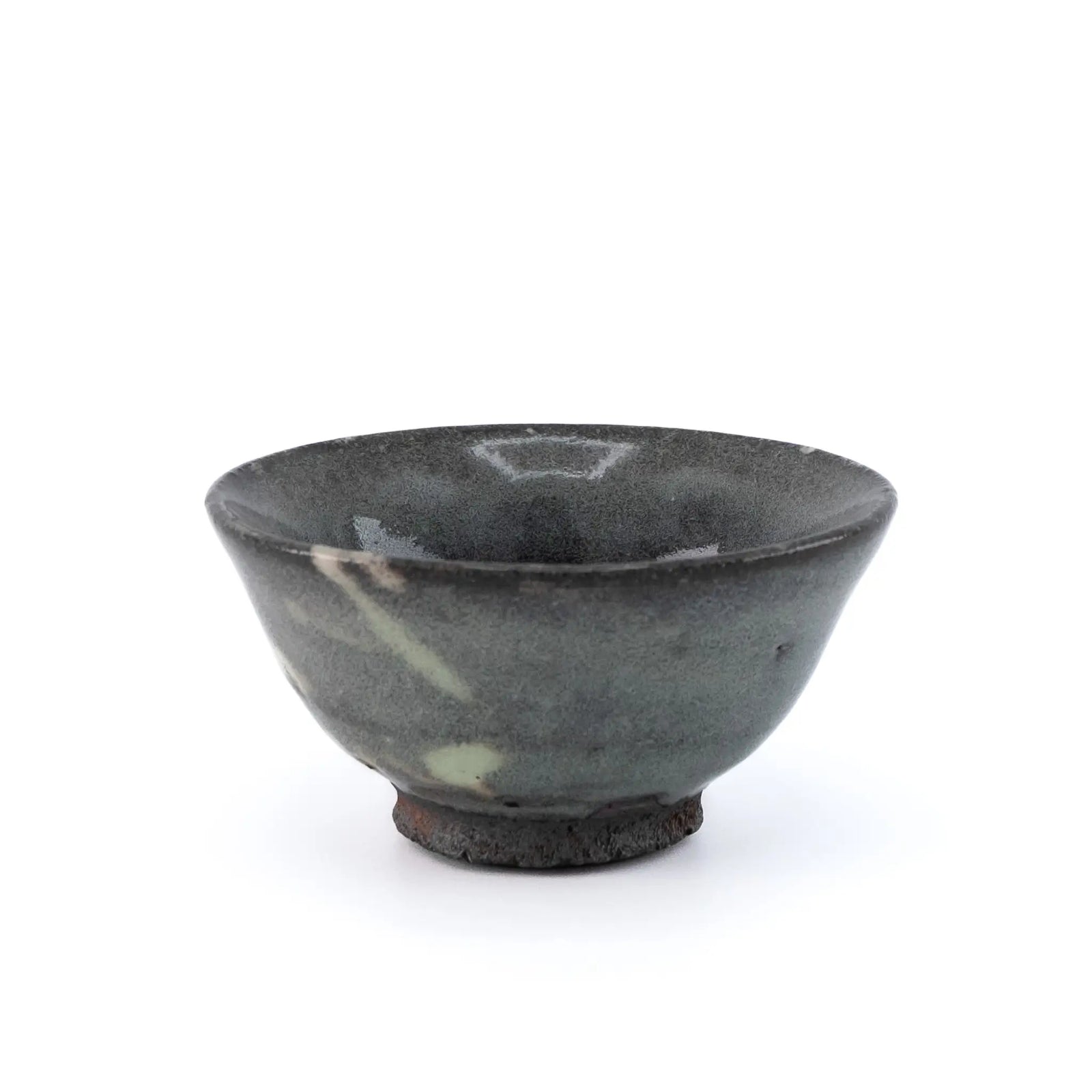 Ceramic cup with a speckled glaze on a white background