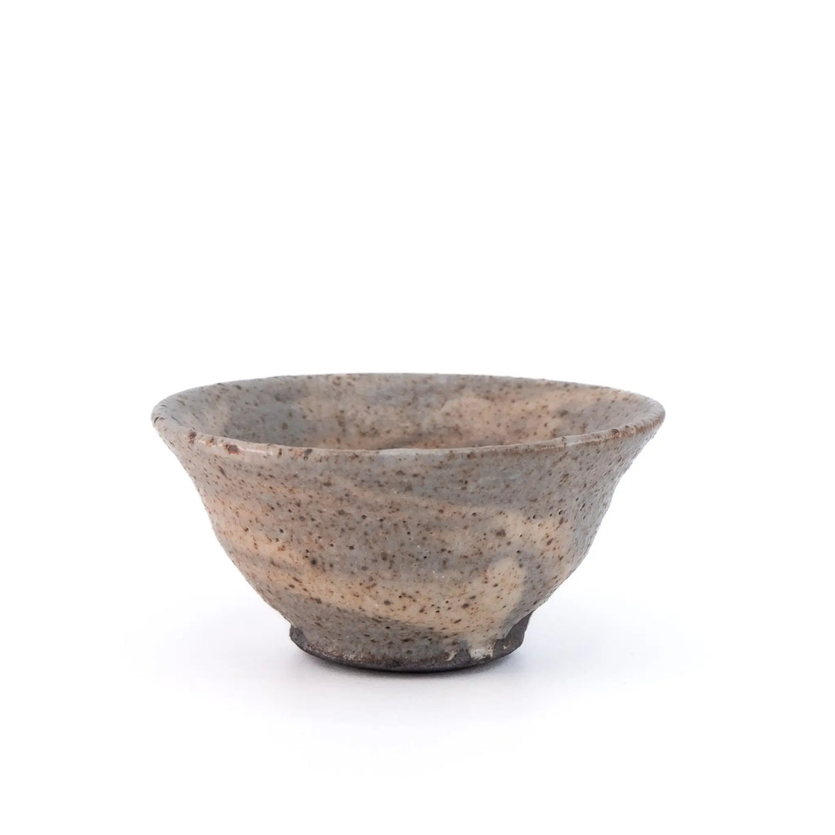 Ceramic cup with speckled texture on a white background
