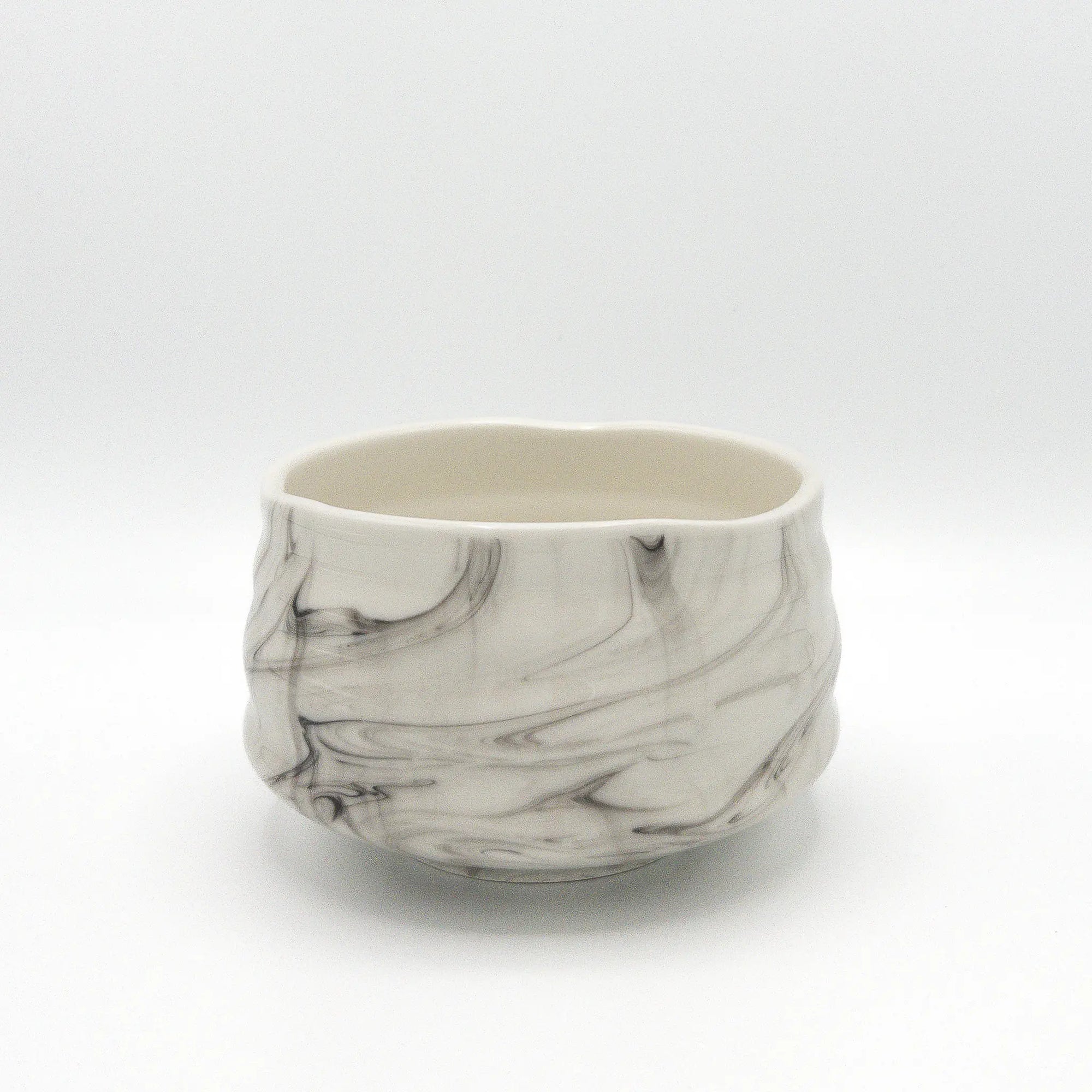 Marbled ceramic bowl on a white background