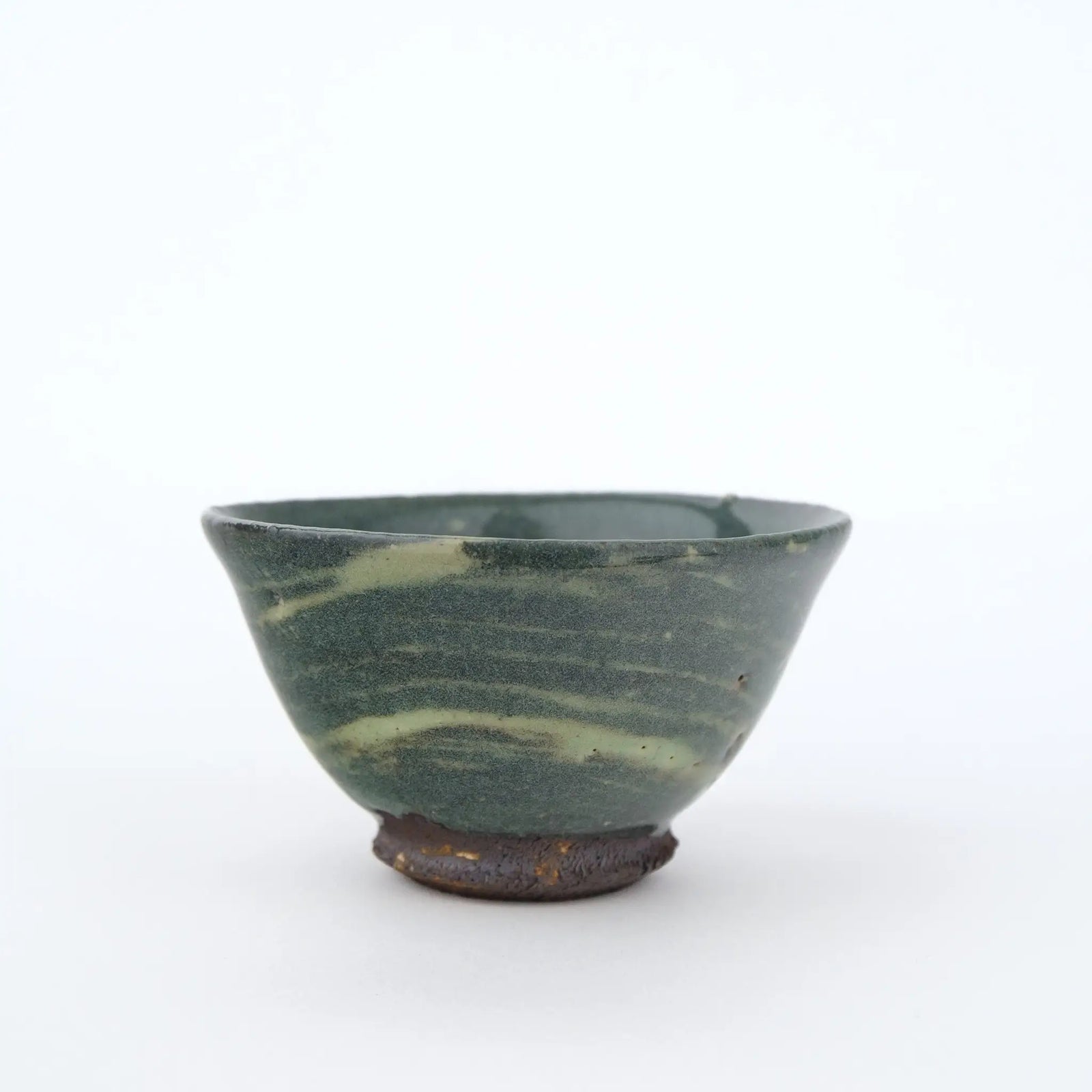 Ceramic teacup on a white background