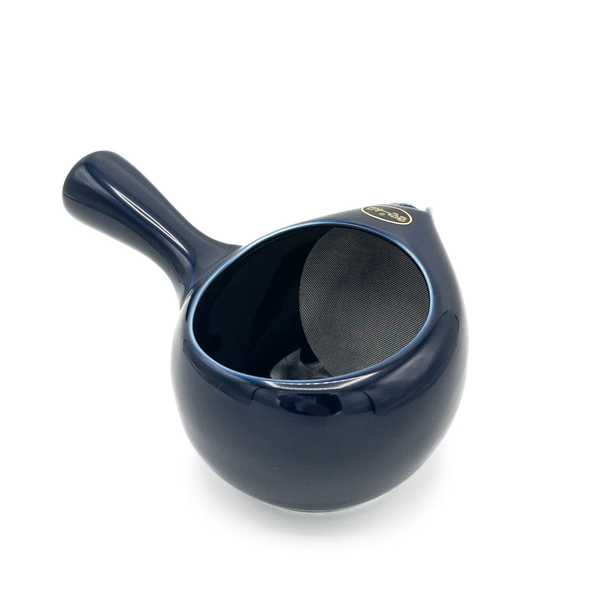 Blue ceramic tea infuser with mesh filter on a white background