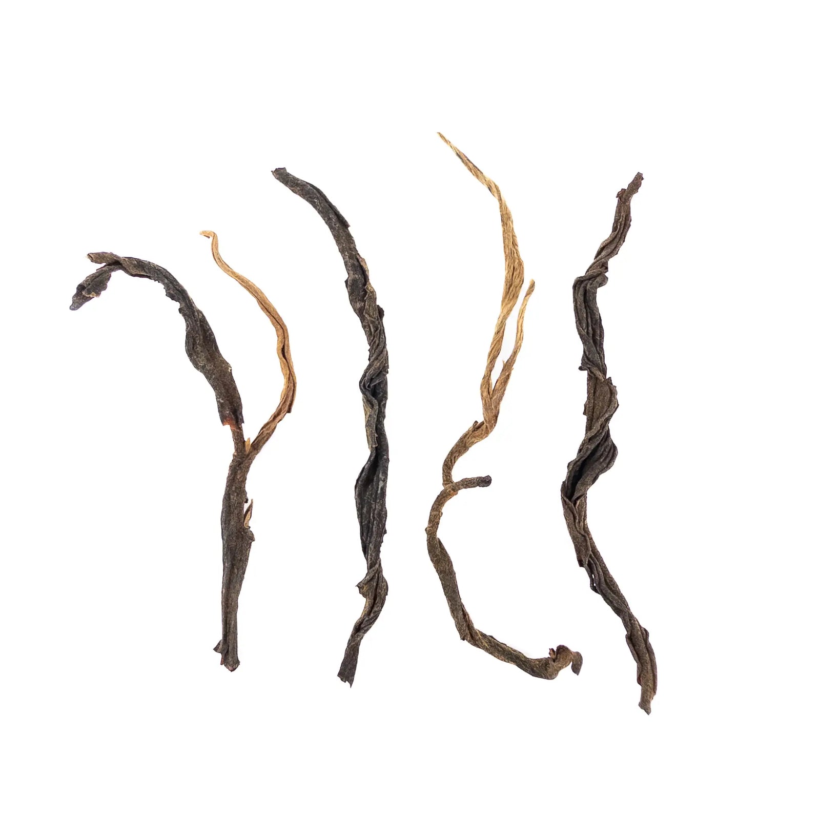 Dried tea leaves from Laos on a white background