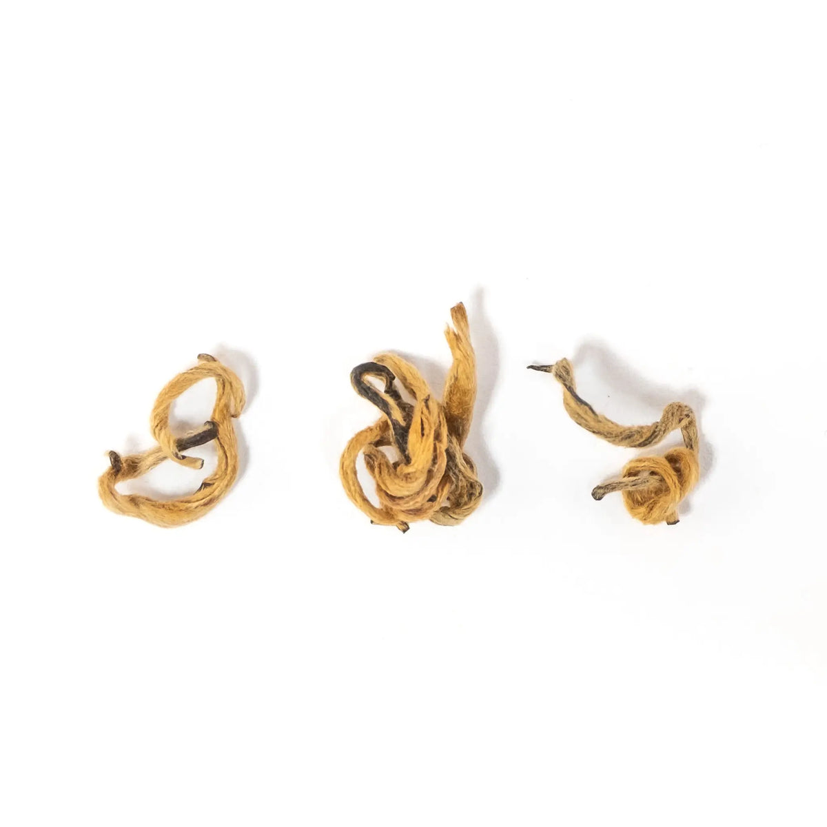 2026 Red Sun - Yunnan Golden Buds Black Tea leaves - on white background