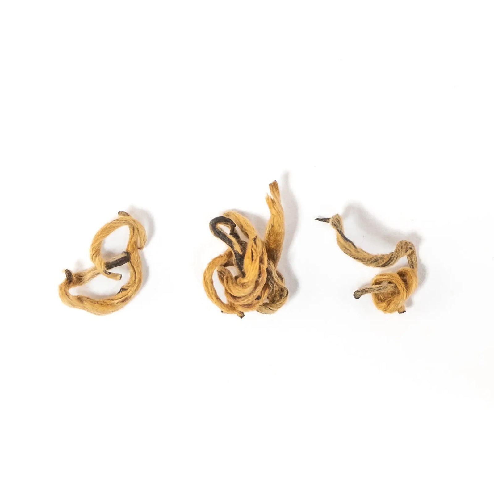 2026 Red Sun - Yunnan Golden Buds Black Tea leaves - on white background