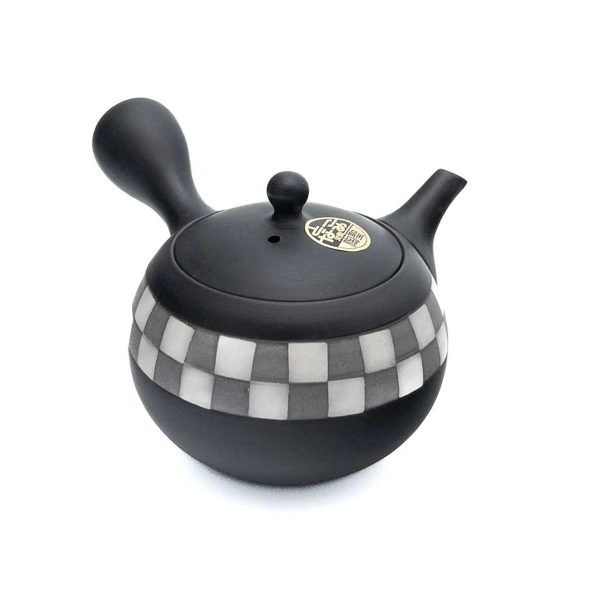 Black teapot with checkered pattern on a white background
