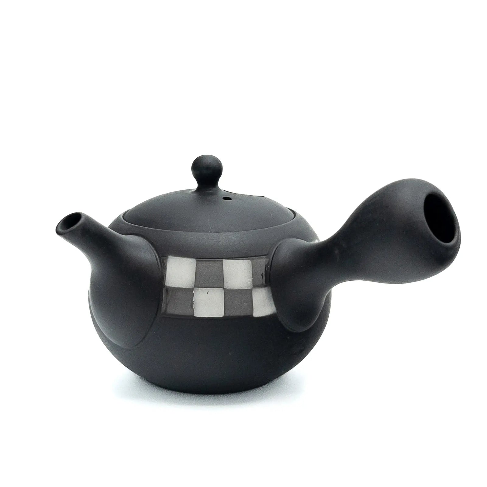 Black teapot with a checkered pattern on a white background