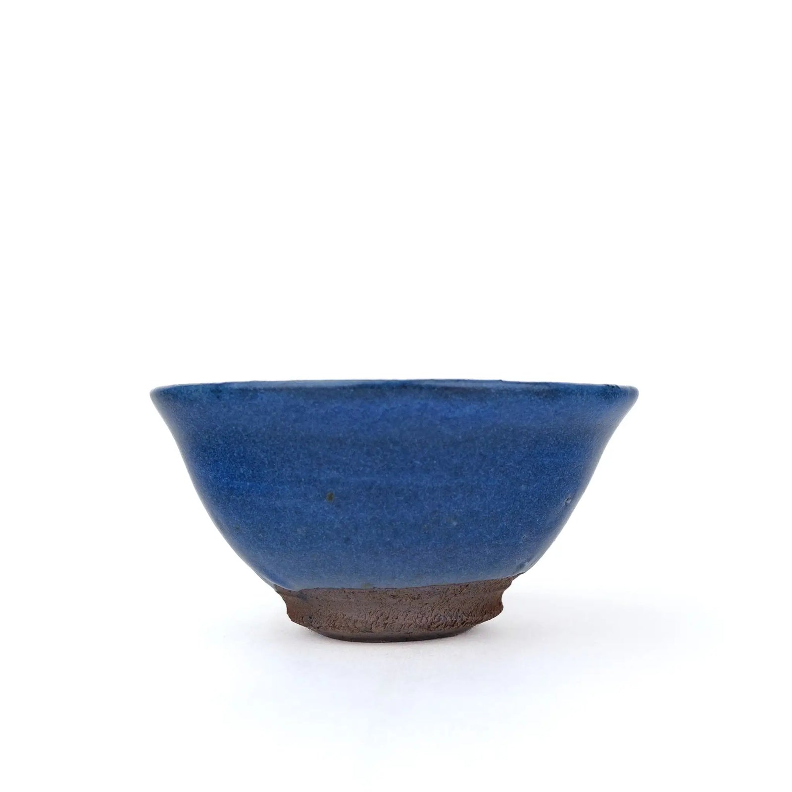 Mark Mohler gong fu cup #2Q, smooth side of the flared cup in an even deep blue glaze above the unglazed foot