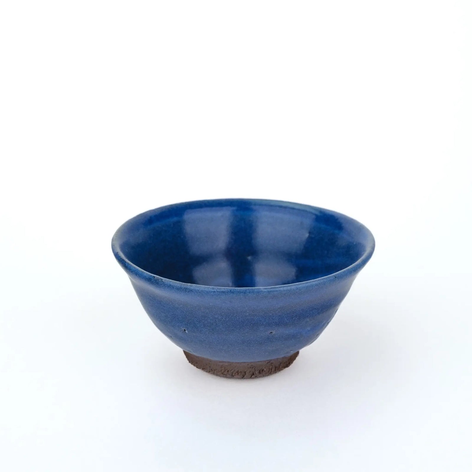 Mark Mohler gong fu cup #2Q from a raised angle showing the glossy deep blue glaze inside the cup