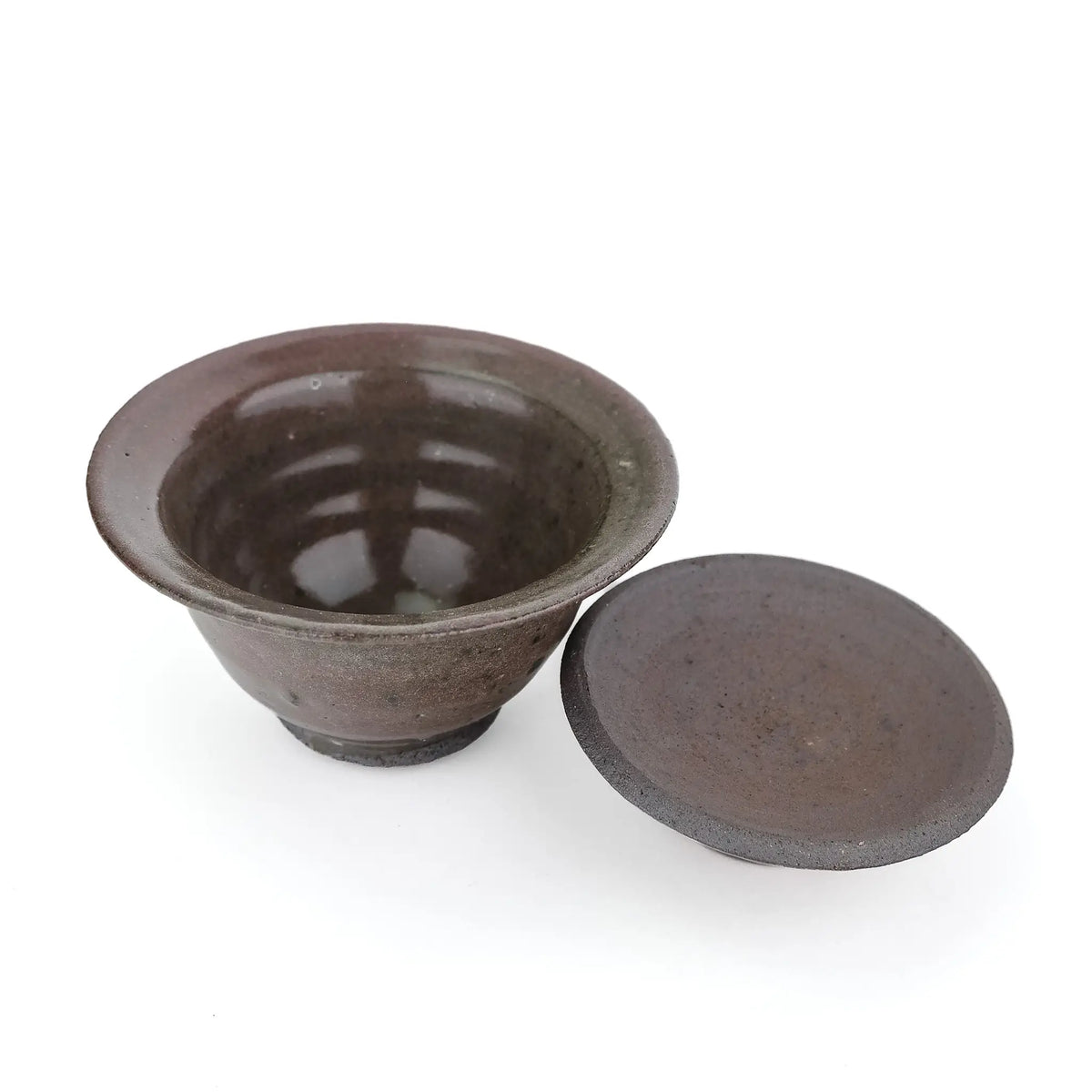 Mark Mohler handmade gaiwan #10 with the lid off and turned over beside the bowl, showing the glossy brown glaze and throwing rings inside the bowl