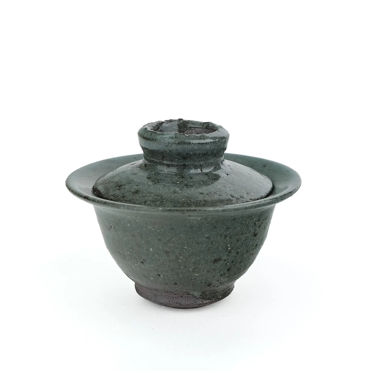 Mark Mohler handmade gaiwan #11 with the lid on, showing the flared rim, knob and speckled dark green glaze above a dark foot