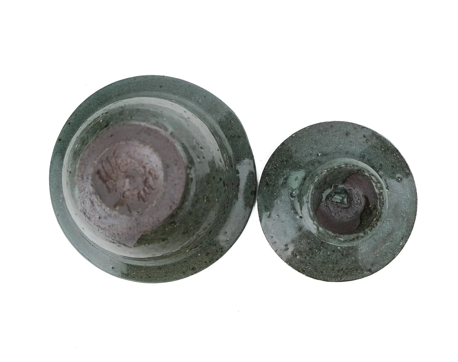 Mark Mohler handmade gaiwan #11 bowl upside down next to the lid from above, showing the unglazed foot with carved marks and the speckled green top of the lid