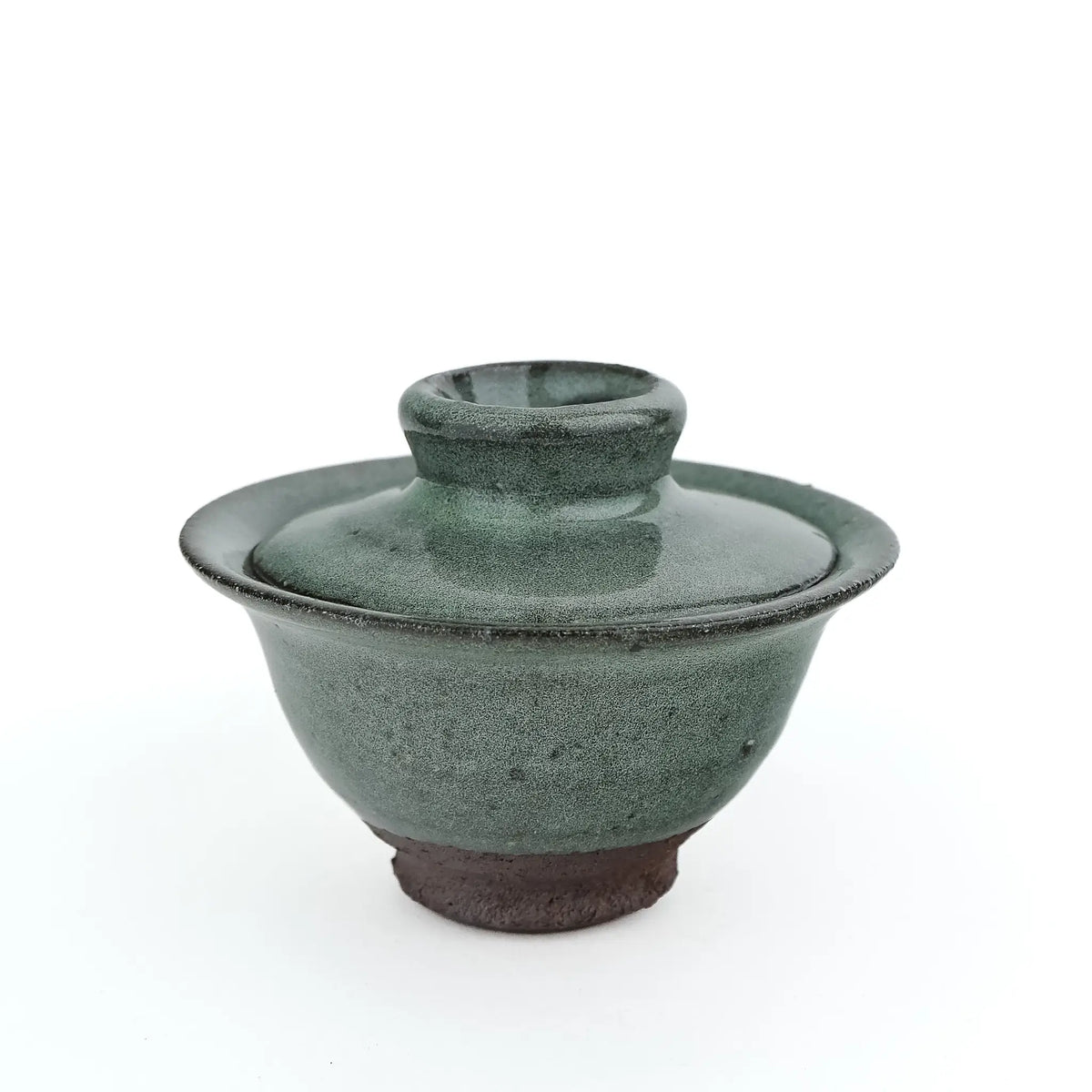Mark Mohler handmade gaiwan #14 from a slightly raised angle with the lid on, showing the knob, flared rim and green glaze