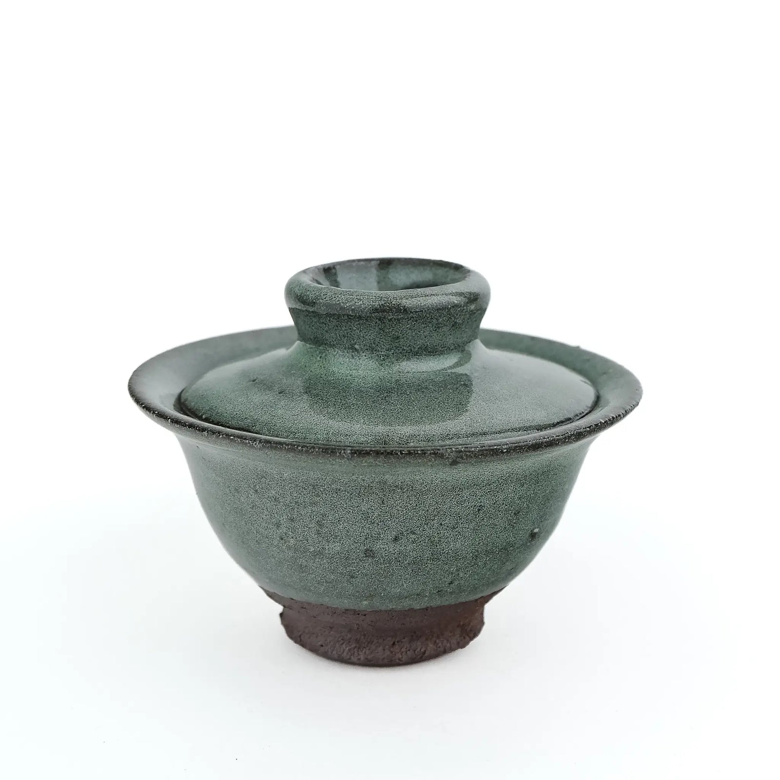 Mark Mohler handmade gaiwan #14 from a slightly raised angle with the lid on, showing the knob, flared rim and green glaze