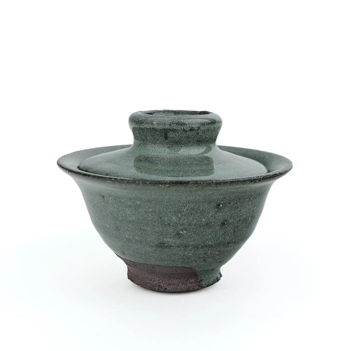 Mark Mohler handmade gaiwan #14, about 90 ml, with the lid on, in a soft green glaze with a dark rim edge over a dark unglazed foot