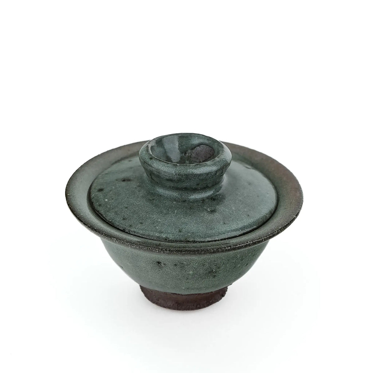 Mark Mohler handmade gaiwan #8, about 100 ml, with its lid on, in a speckled green grey glaze over a dark unglazed foot