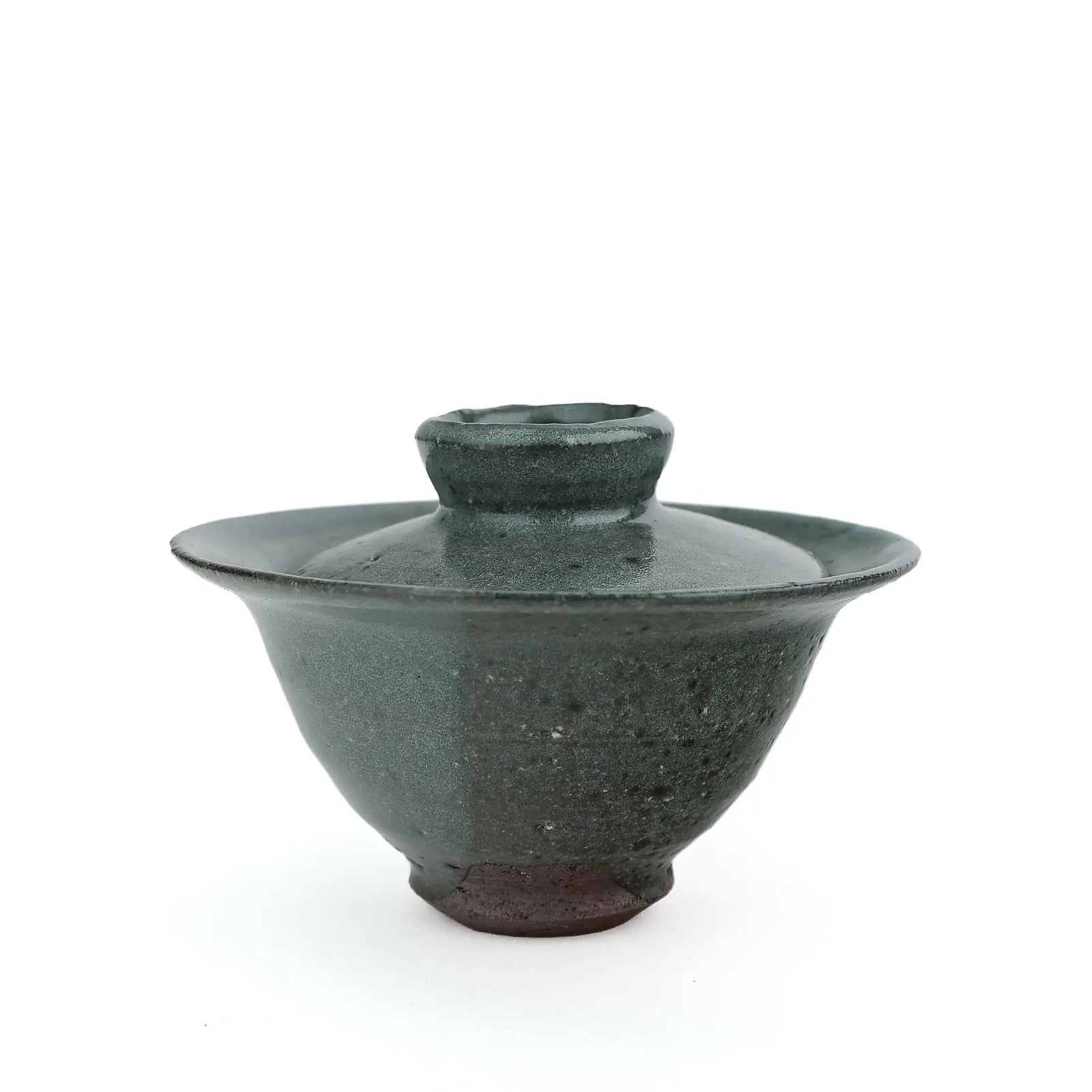 Mark Mohler handmade gaiwan #9, about 90 ml, at eye level with the lid on, in a speckled dark green glaze with a wide flared rim over a dark unglazed foot